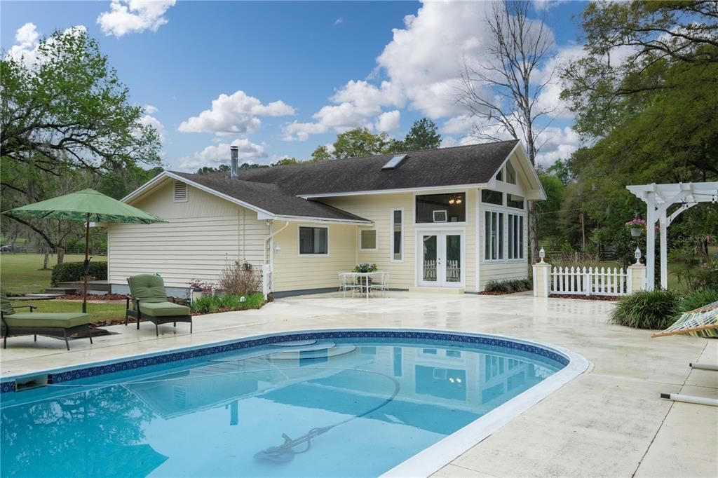 Enjoy the privacy of your pool on almost 4 acres.