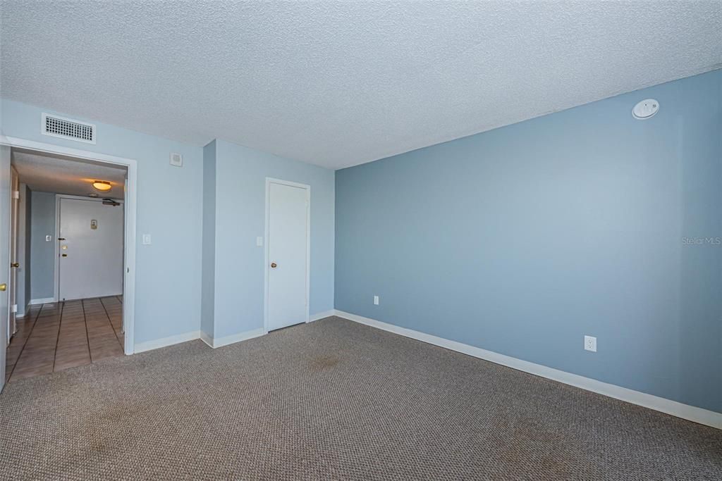 Bedroom has walk-in closet with bathroom access.