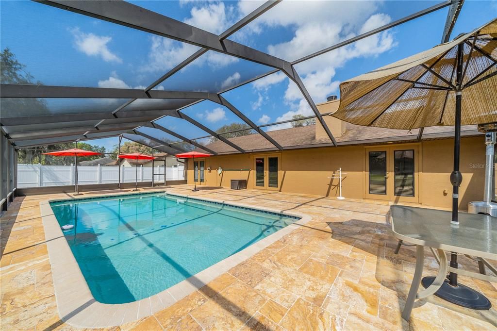 back of house with french doors that open to the pool