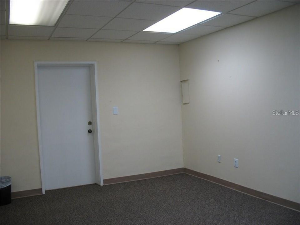 Small office area with door to kitchen