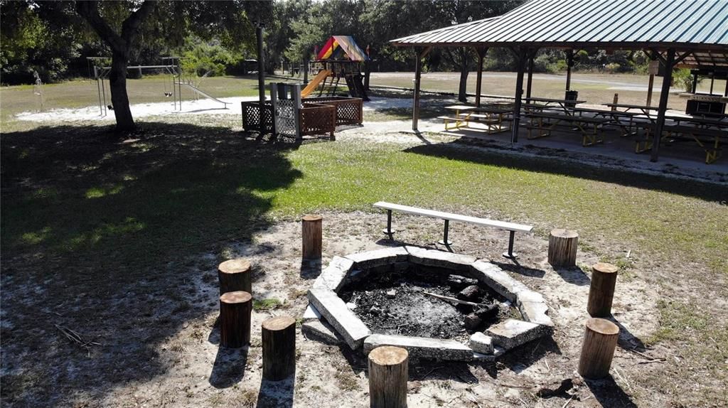 Community fire pit, play ground and covered pavilion area with restrooms available for private functions.