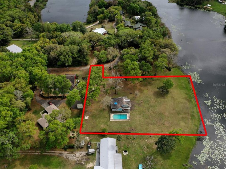 Aerial view of home, outlined boundary lines not accurate. Refer to attached survey.