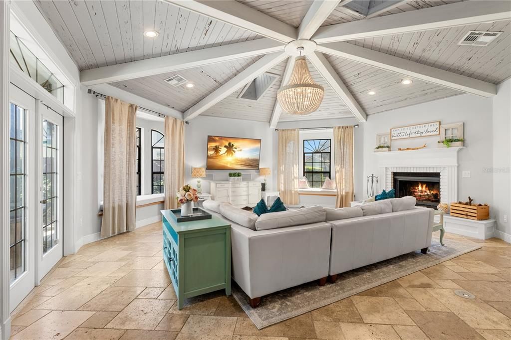 WOW - family room with detailed ceiling and access to the outdoors