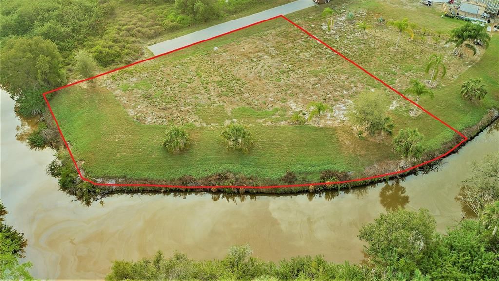 Looking SE view of the northern two of four lots. Approximately 90' water frontage.