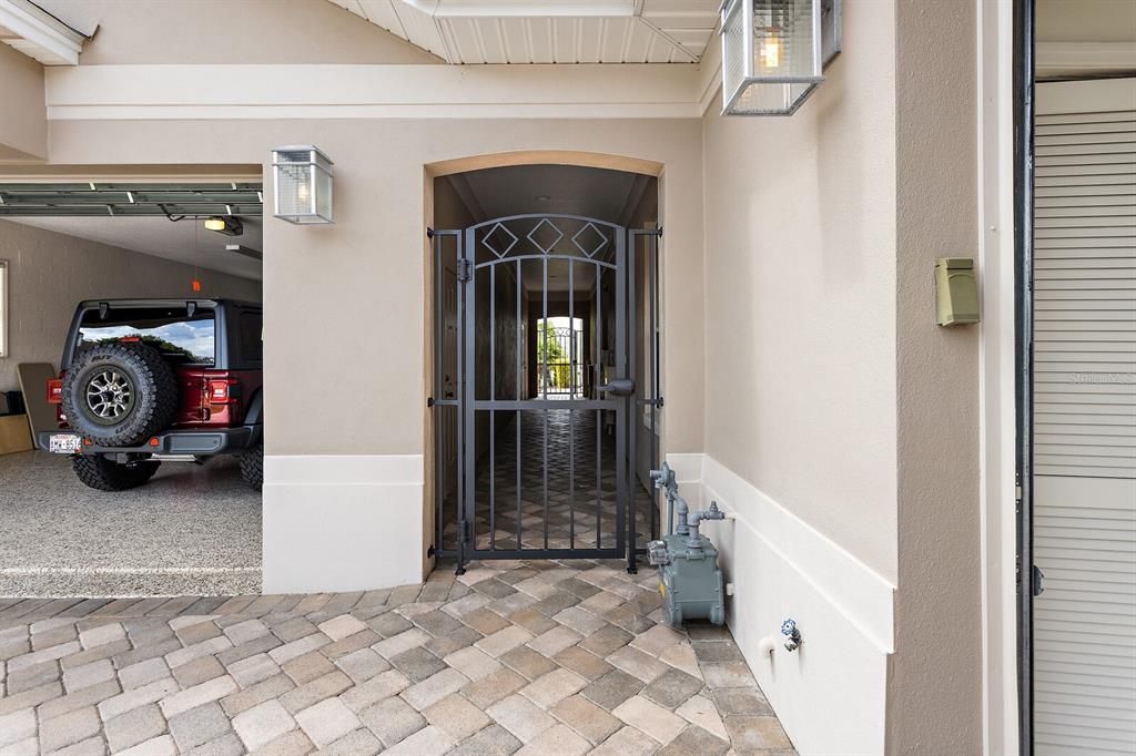 Gated walk way to back of property