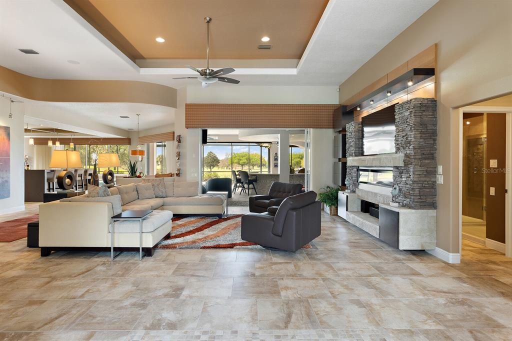 Large living area with tray ceiling