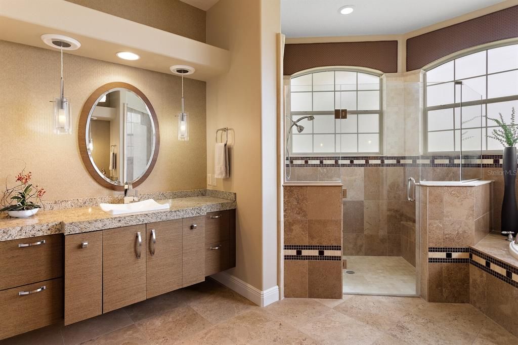 En suite with 2 vanities and upgraded light fixtures