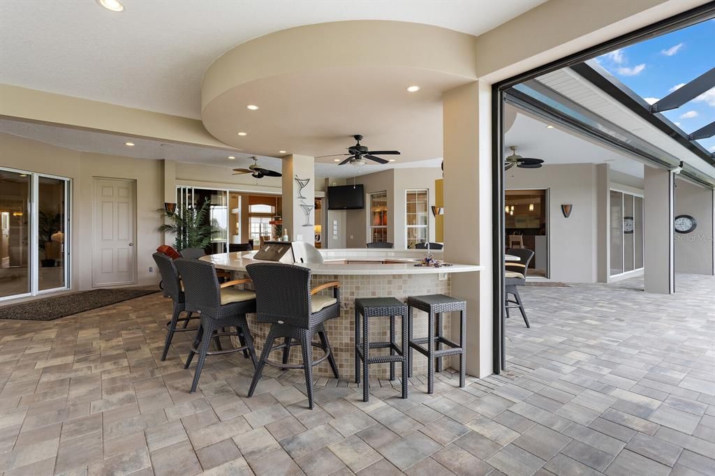 Summer kitchen with ceiling fan