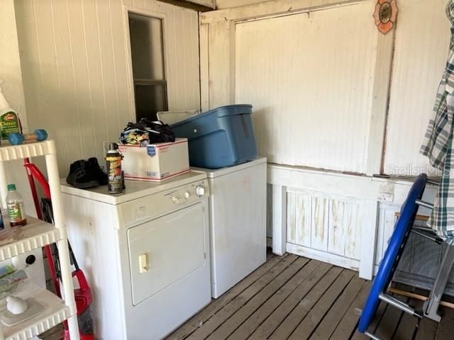 VIEW OF AREA FOR WASHER DRYER ON BACK PORCH