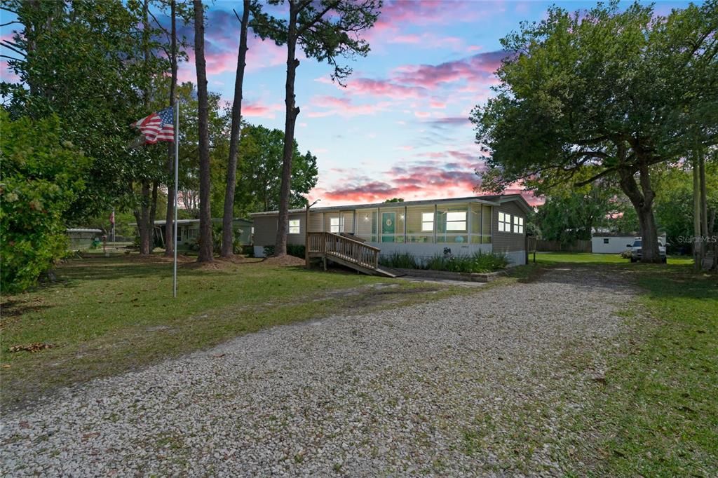Enjoy this 3 bedroom home on over 1/2 acre conveniently located between Titusville and Orlando