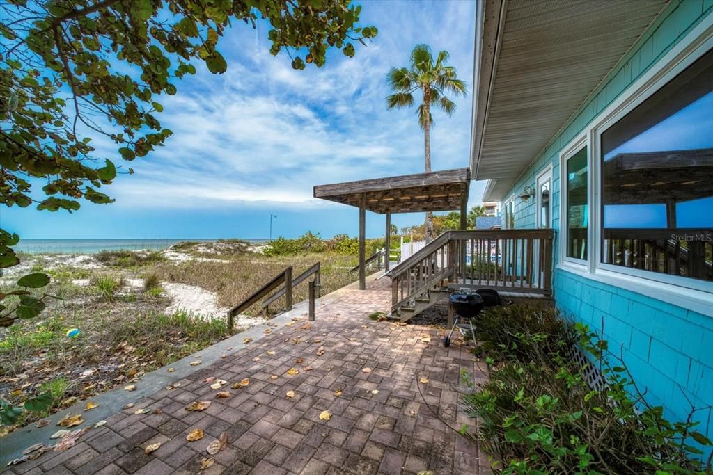 Large paved patio is a great place to enjoy the Florida weather.