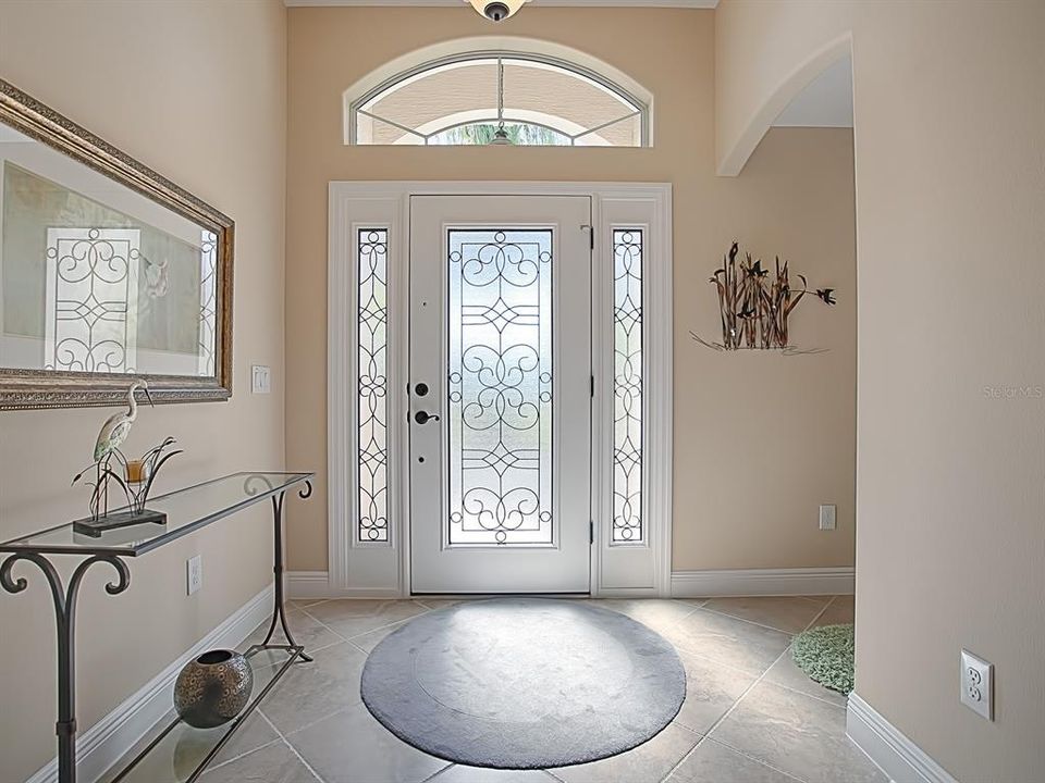 LOVELY DECORATIVE GLASS FRONT DOOR WITH SIDELITES!