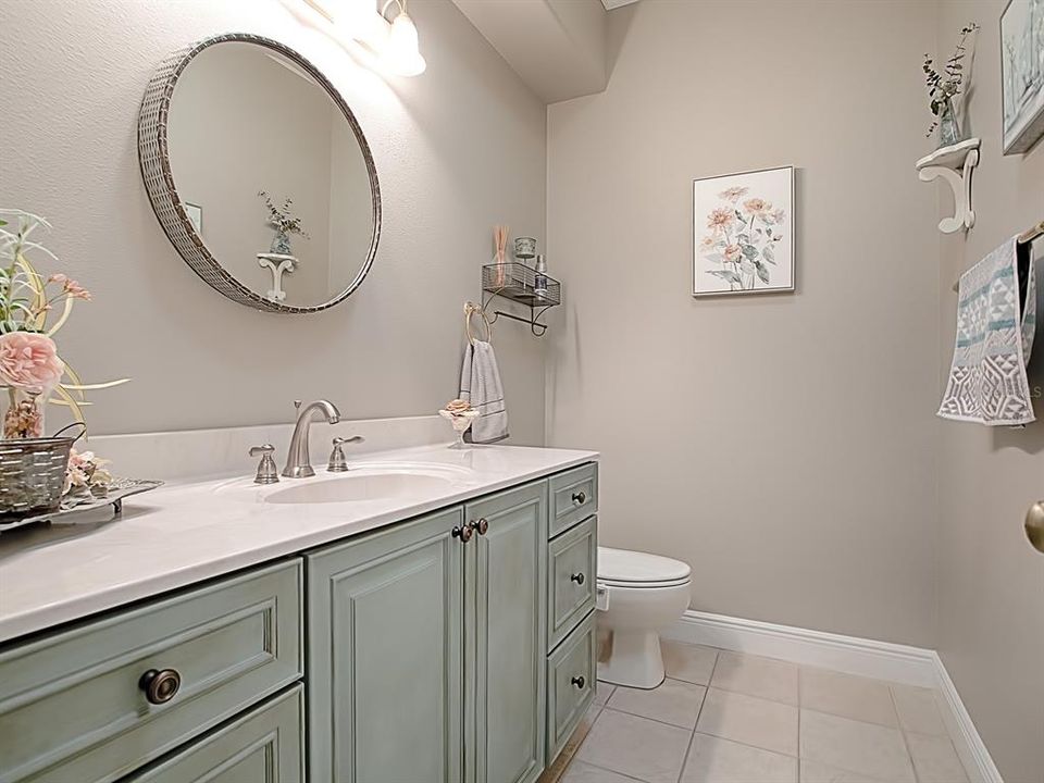 IN THE HALLWAY ACROSS FROM THE KITCHEN, A HALF BATH FOR YOUR GUEST!