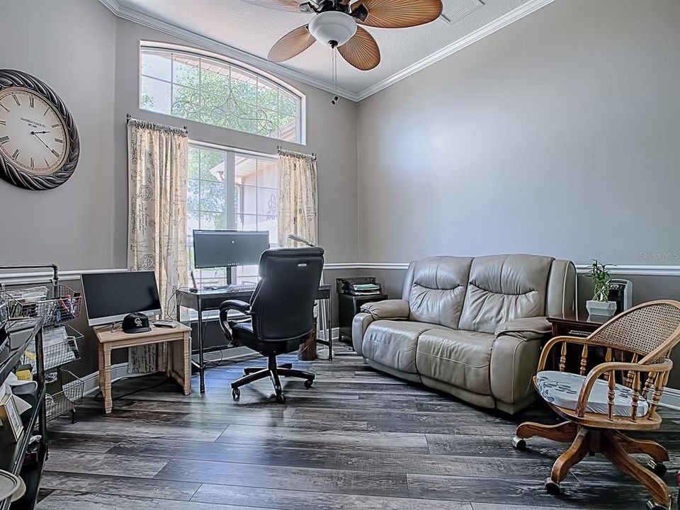 THIS 4TH BEDROOM WHICH IS BEING USED AS AN OFFICE HAS LAMINATE FLOORING AND IS TO THE LEFT OF THE FOYER AS YOU ENTER THE HOME!