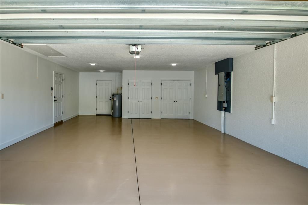 Garage with epoxy floor & utility cabinets