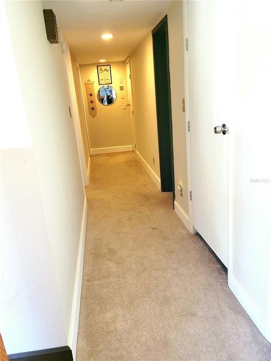 Hallway to bedrooms and bathrooms