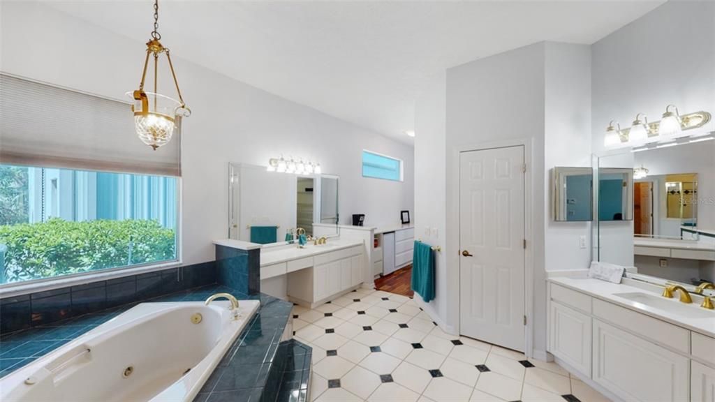 Master Bathroom with Quartz Countertops, Garden Tub and Amazing Shower