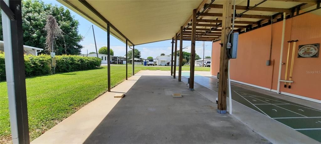 Long covered double carport (with shuffleboard)