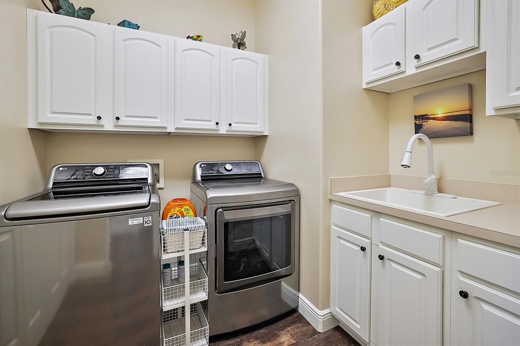 Inside Laundry Room with Sink convey Washer and Dryer!