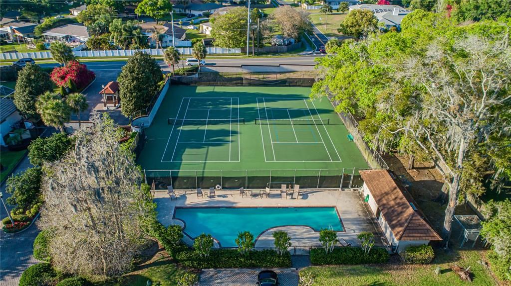 Aerial view of swimming pool and tennis court