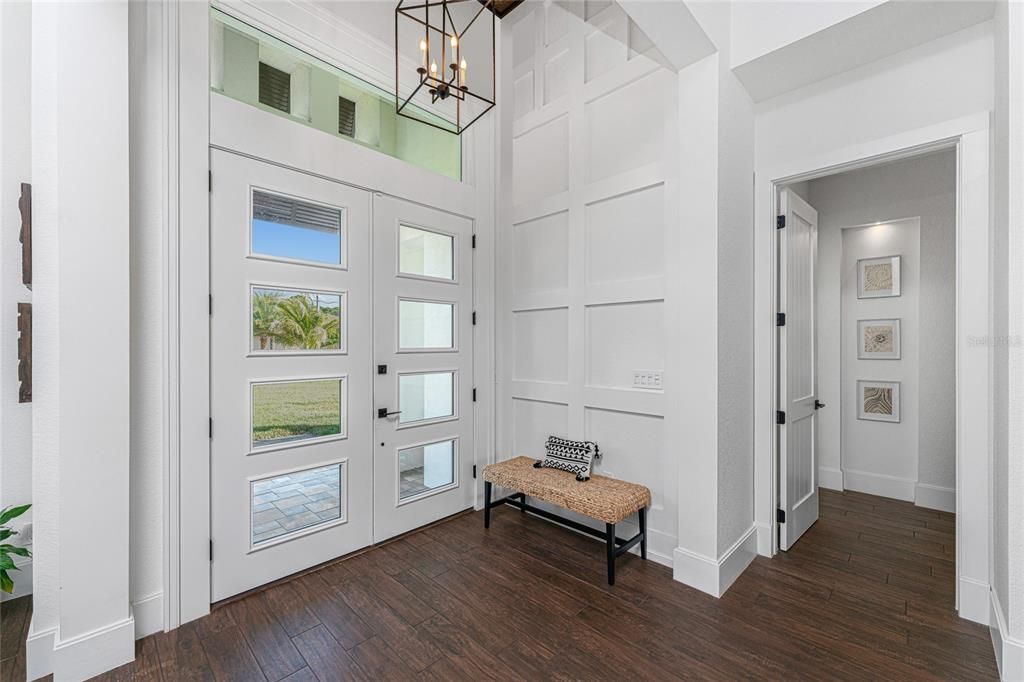 A transom window above the front door allows abundant natural light to grace the entry.