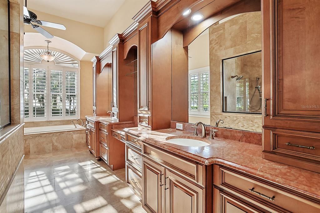 Spa-worthy en-suite with dual granite sink vanities