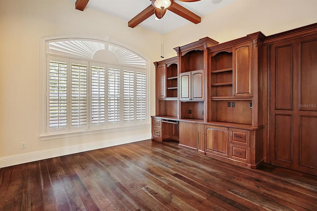 A separate study with built-ins and desk is ideal for an office or cozy library