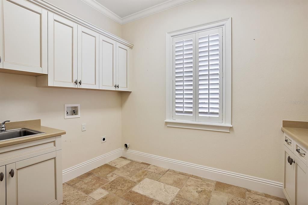 Laundry Room with utility sink and folding area