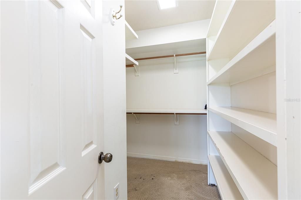 Walk-in closet one of two in Owner's suite