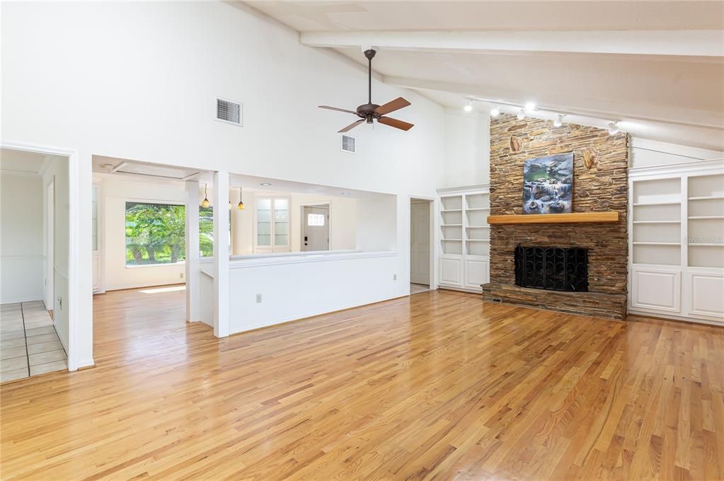 View of Living room, staircase to lower level and Formal Dining