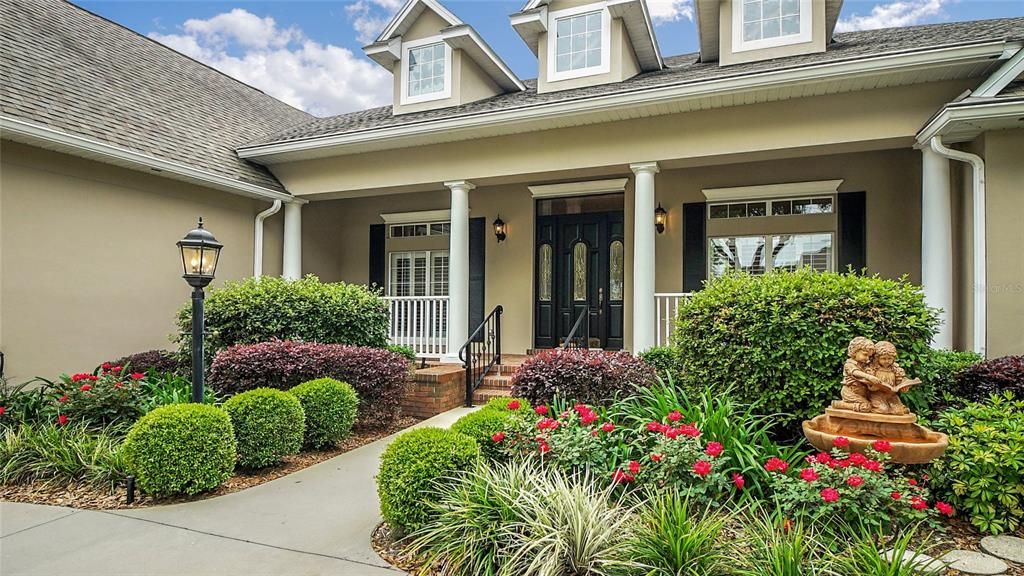 Beautiful landscaping accents this home. And - it has gutters with leaf guards so maintenance is minimized.