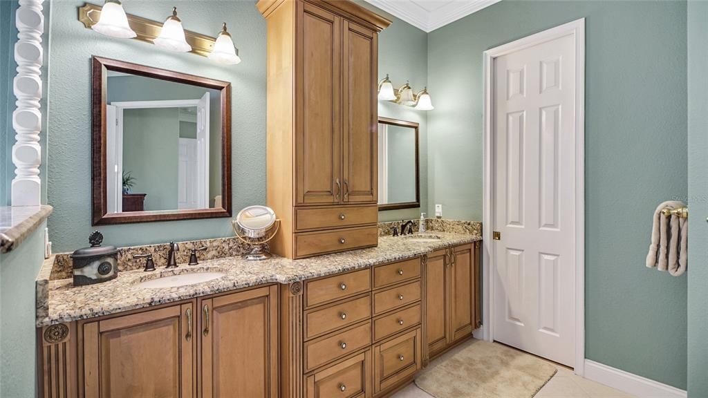 The dual vanities and custom cabinetry make your mornings a breeze and getting ready for a night out fun!