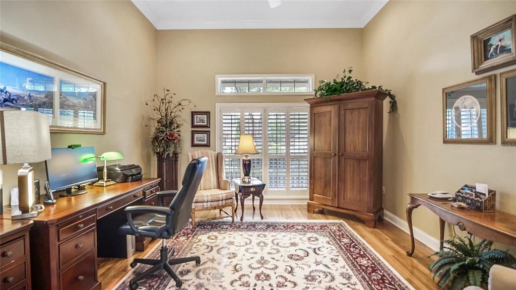 Just off the family room is this lovely office for those times when you must retreat and get some work done!