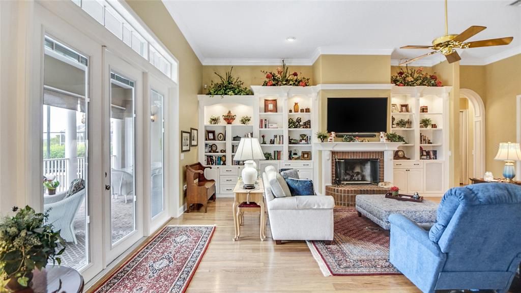 Begin your get-togethers by the raised-hearth gas fireplace and showcase treasures in the built-in bookcase.