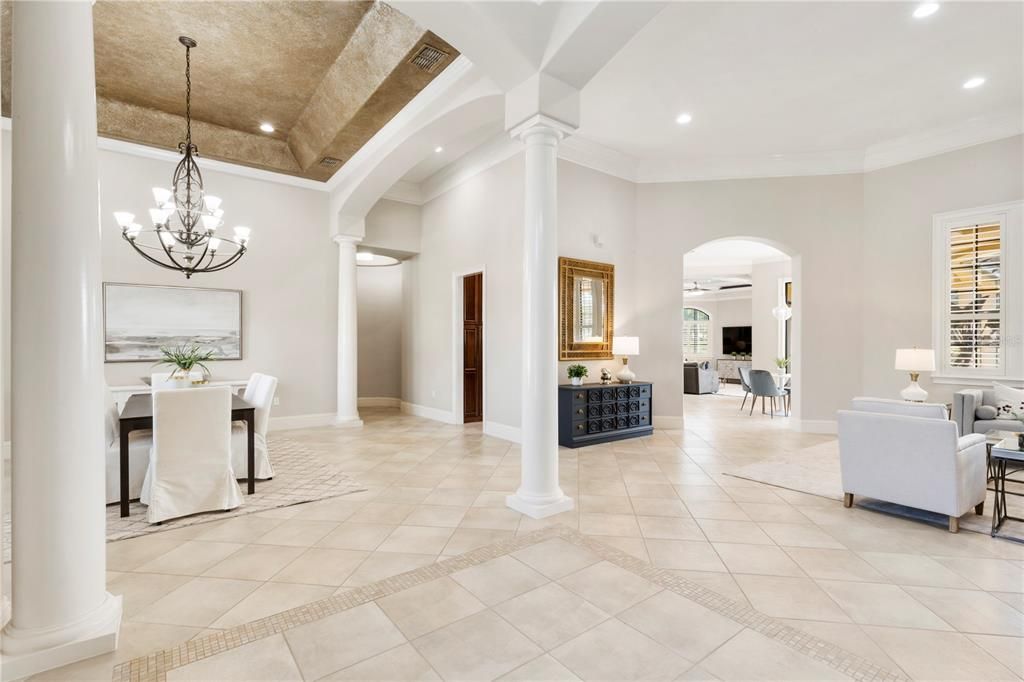 View from foyer to dining room and formal living room