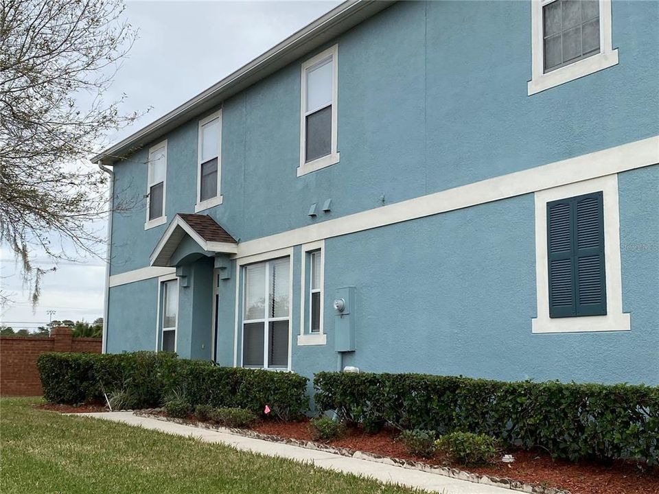 Exterior Side of Home with Front Door