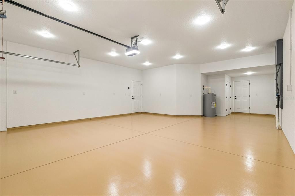 2 car + tandem garage, epoxy floor, custom lighting