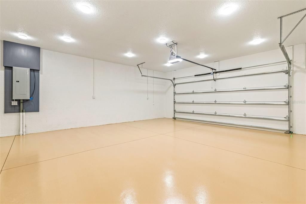 2 car + tandem garage, epoxy floor, custom llghting