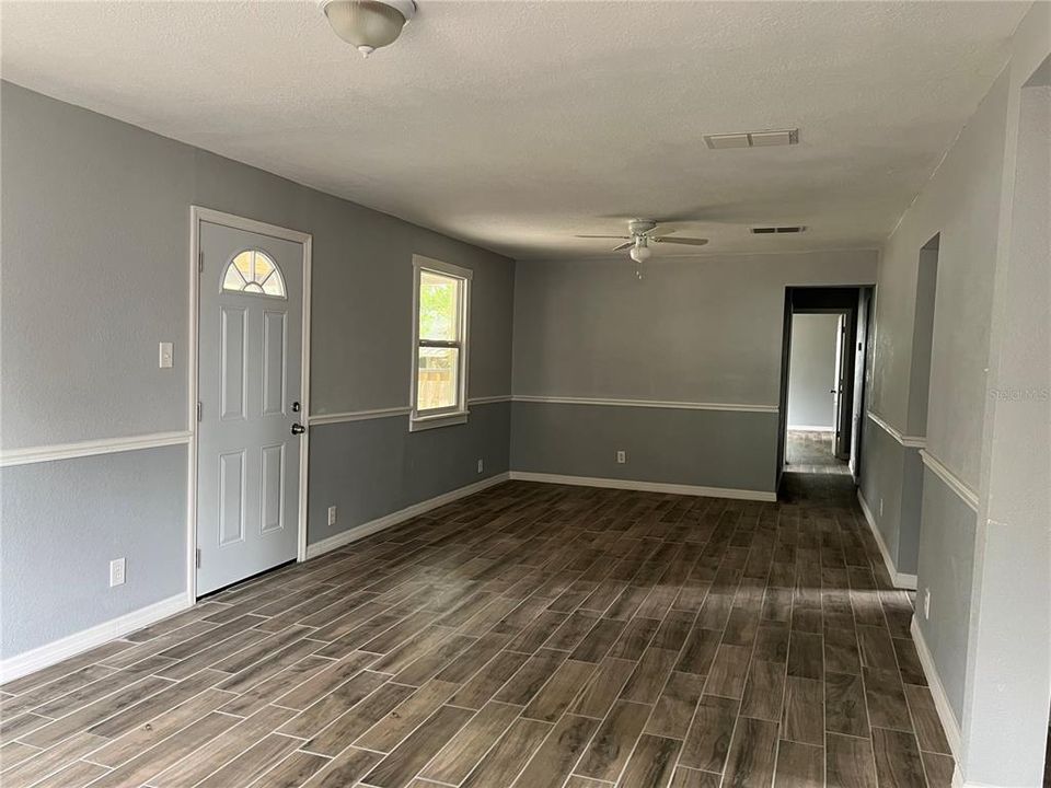 This is the living room.  The entire house has been remodeled and has tile throughout.