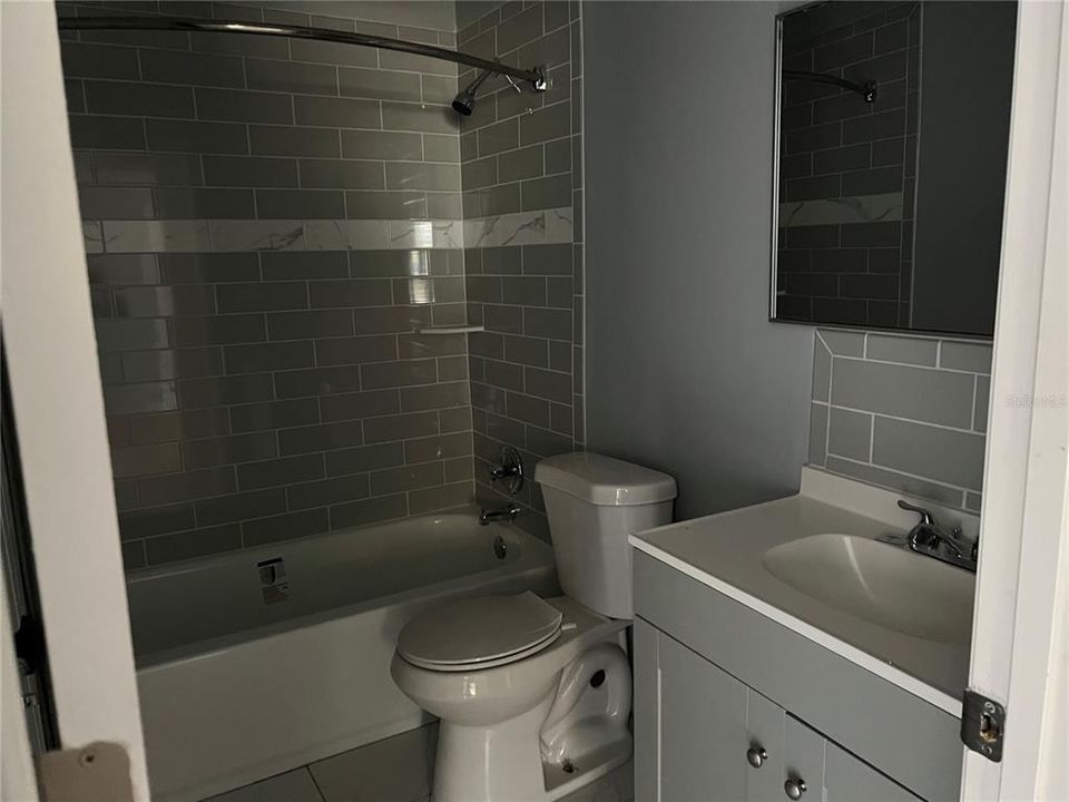 Bathroom #2 has a tub and shower and is totally renovated.