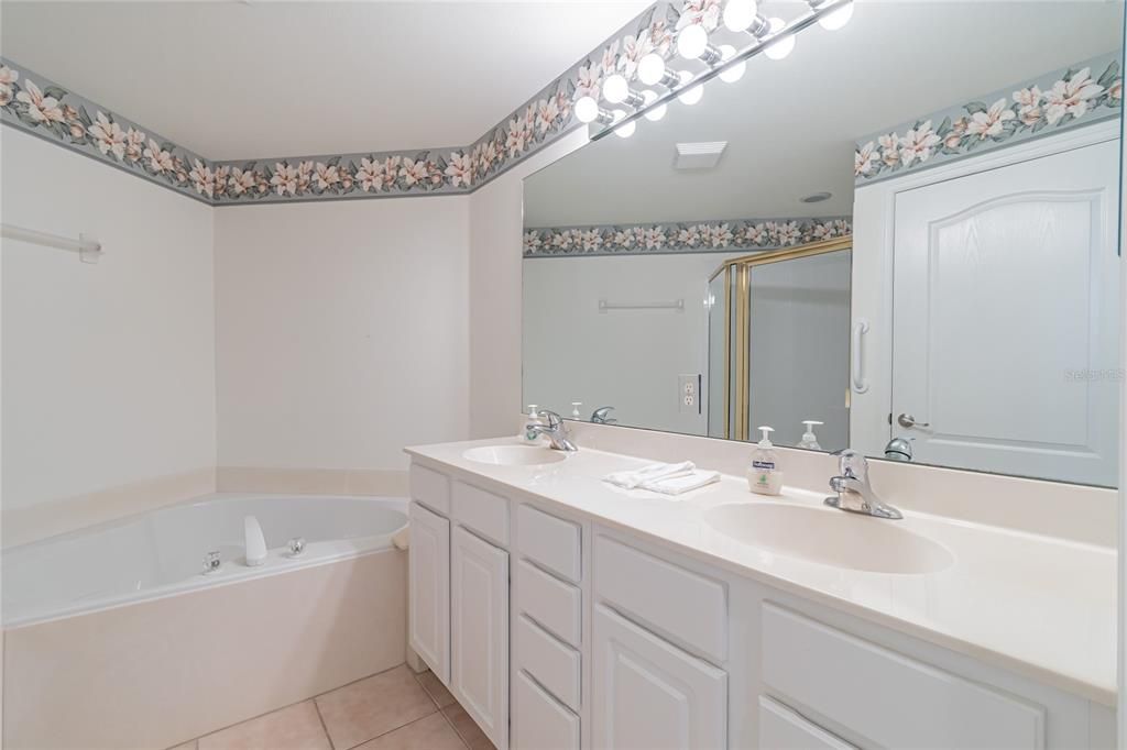 Master bath with soaking tub and separate shower