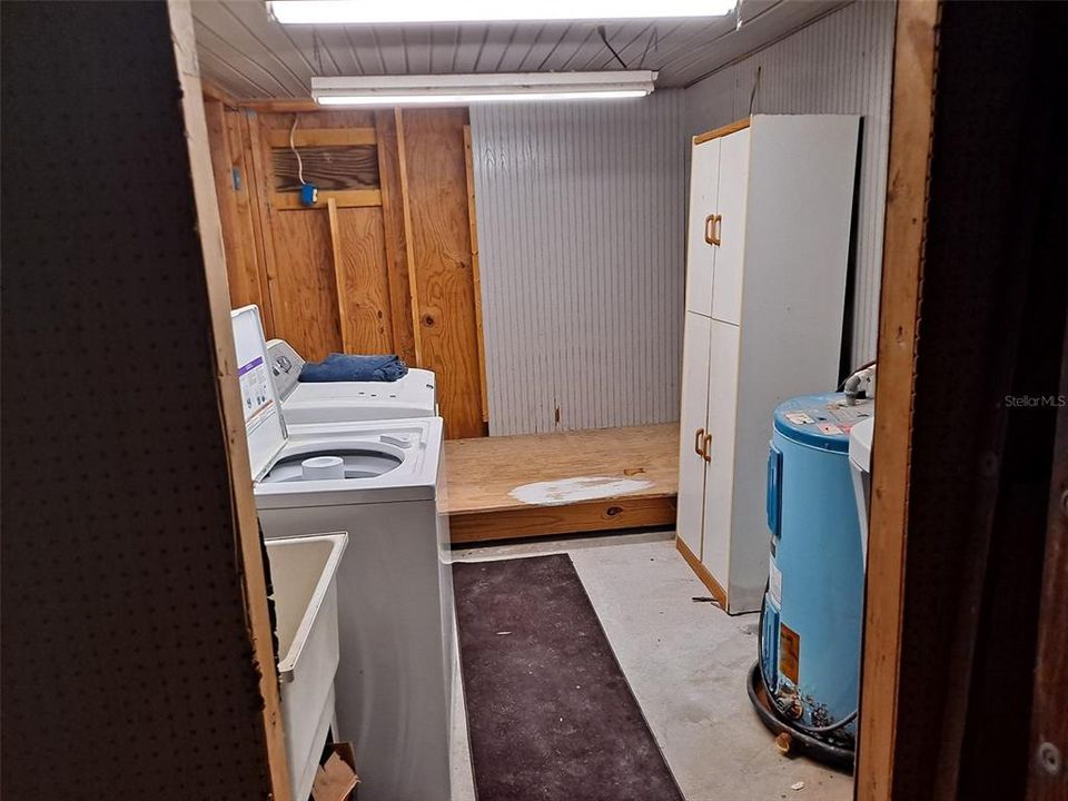 Laundry room in detached garage