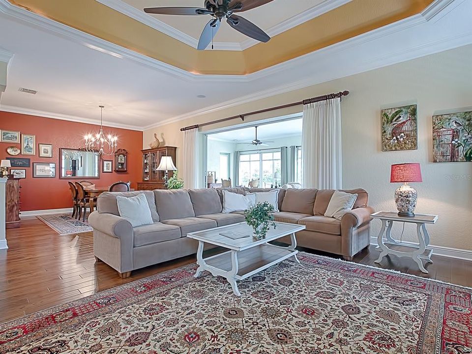 STACK BACK SLIDING GLASS DOORS THAT OPEN TO THE EXPANDED 13 X 33 FLORIDA ROOM!