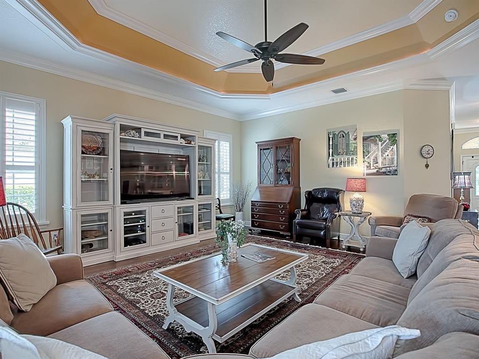 CROWN MOLDING AND PLANTATION SHUTTERS THROUGHOUT THE HOME!  CROWN TRIM IN THE TRAY CEILING!