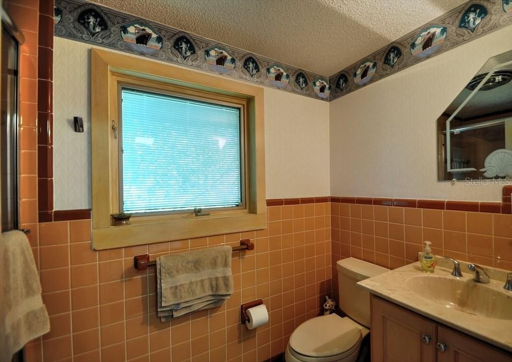 Guest Bathroom with Custom Moon Bay Mirror