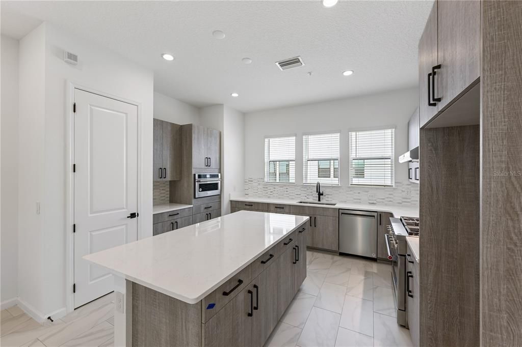 Plenty of countertop space and a large pantry.