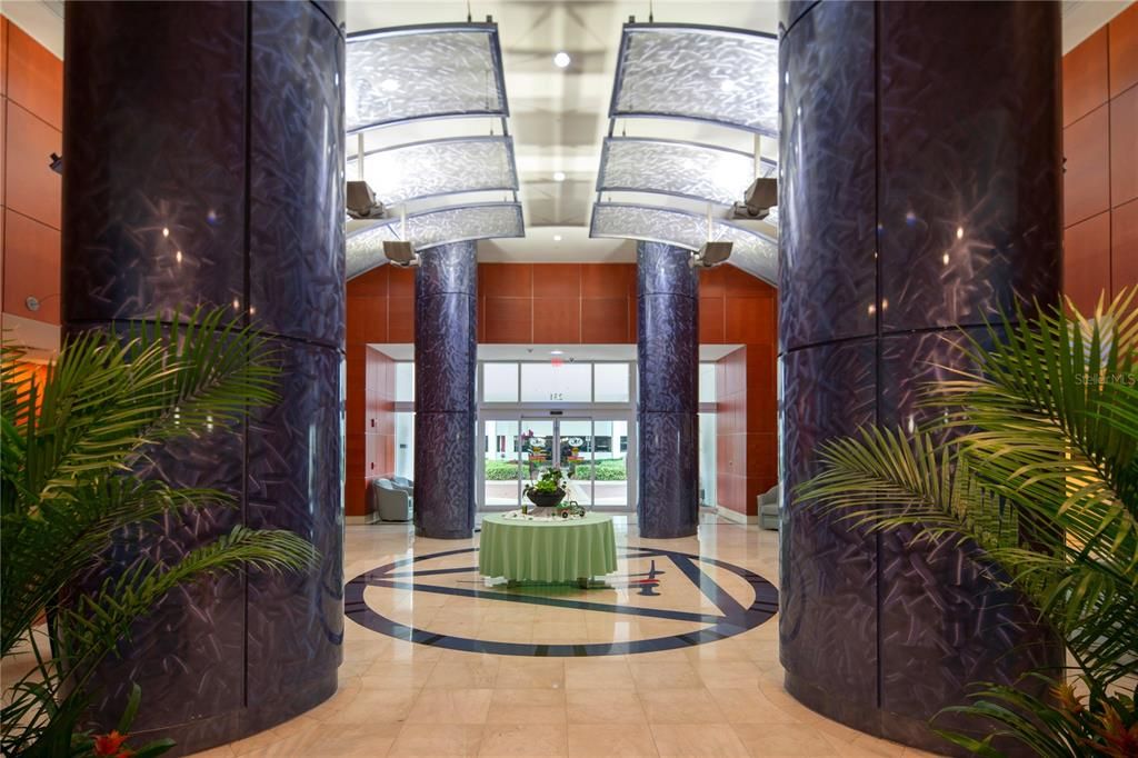 Entrance to Marina Grande lobby with concierge services and elevators.