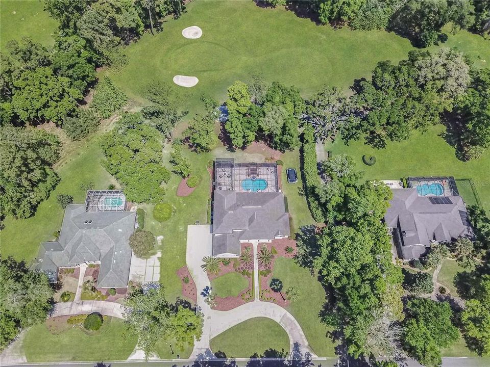 Sits perfectly on one acre at the 4th green of the Country Club of Ocala