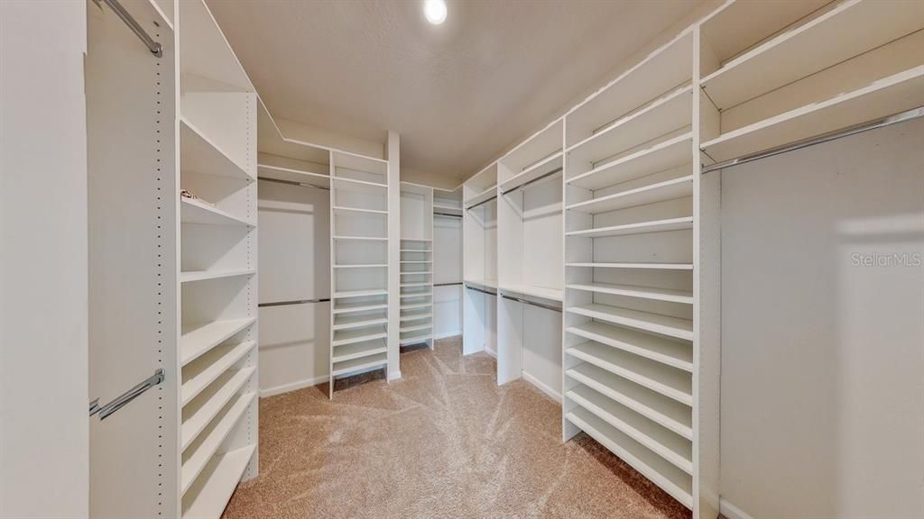 Master closet with built in shelves