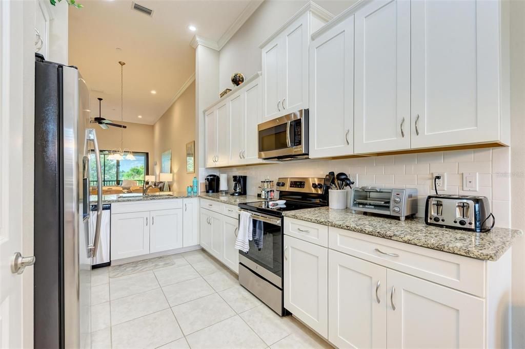 Bright, open kitchen overlooking the living/dining combo